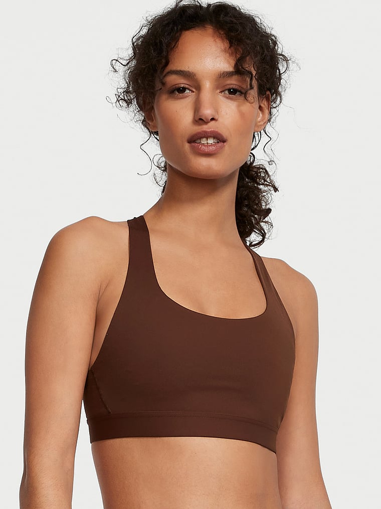 Victoria's Secret, VSX The Flex Sports Bra, Ganache, onModelFront, 1 of 5 Nikita is 5'10" or 178cm and wears 34B or Small