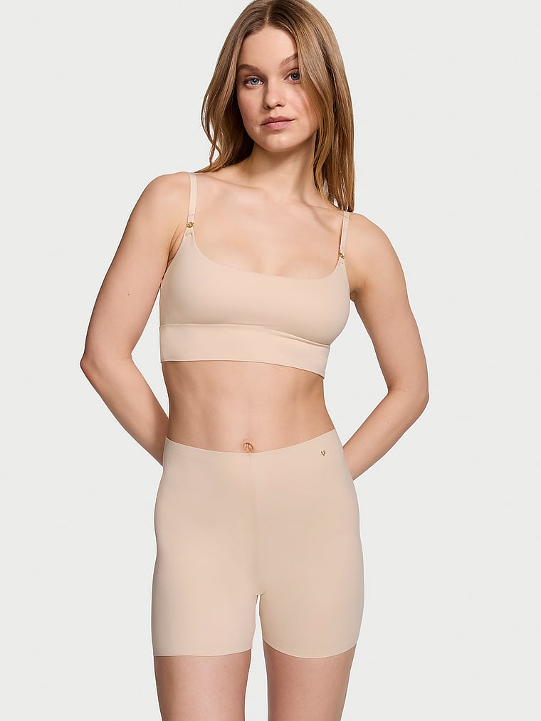 Victoria's Secret, Victoria's Secret Bodywear by Victoria with FeatherSoft™ Innovation Bike Shorts, Marzipan, onModelFront, 1 of 4 Lotta is 5'10" or 178cm and wears Small