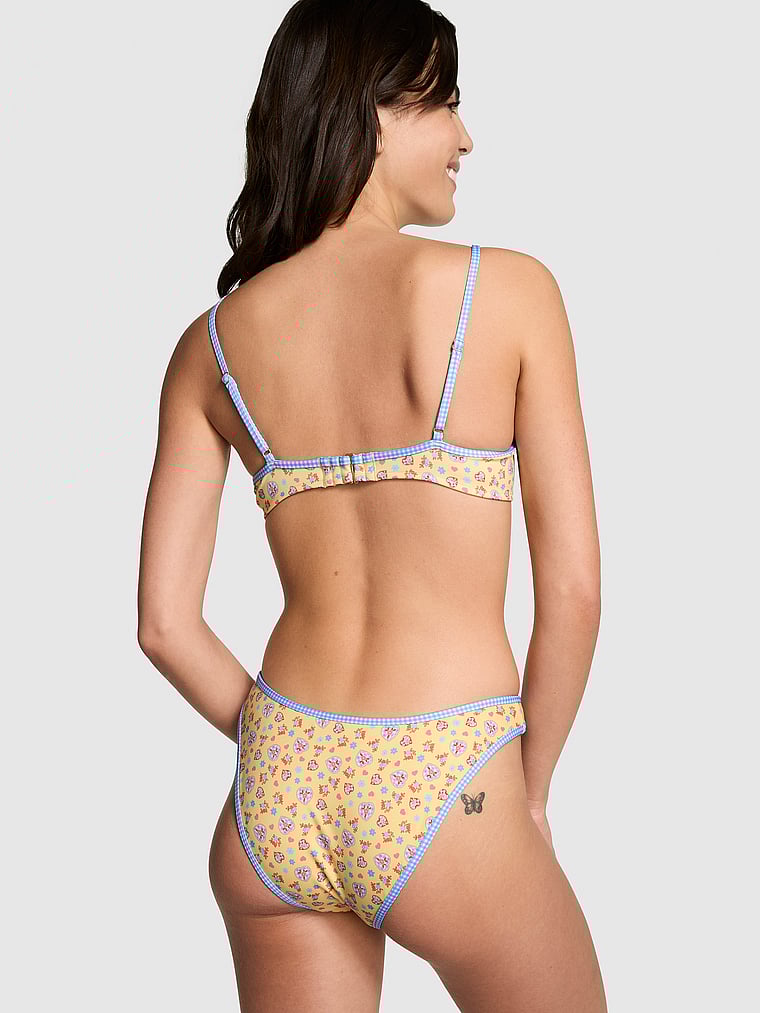 PINK by Frankies Bikinis Golden Hour Bikini Bottom, Heart Charm, onModelFront, 1 of 4 Scarlett is 5'11" or 180cm and wears Small