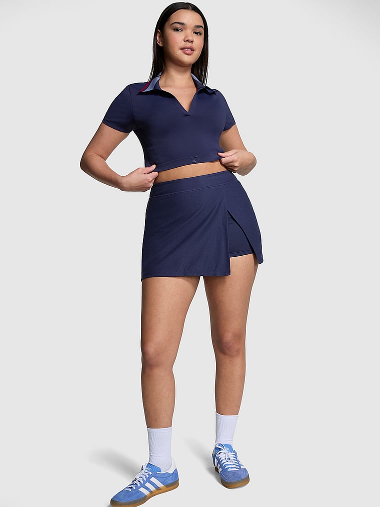 PINK Piqué Tennis Skort, Midnight Navy, onModelFront, 3 of 4 Breanna is 5'8" or 173cm and wears Medium