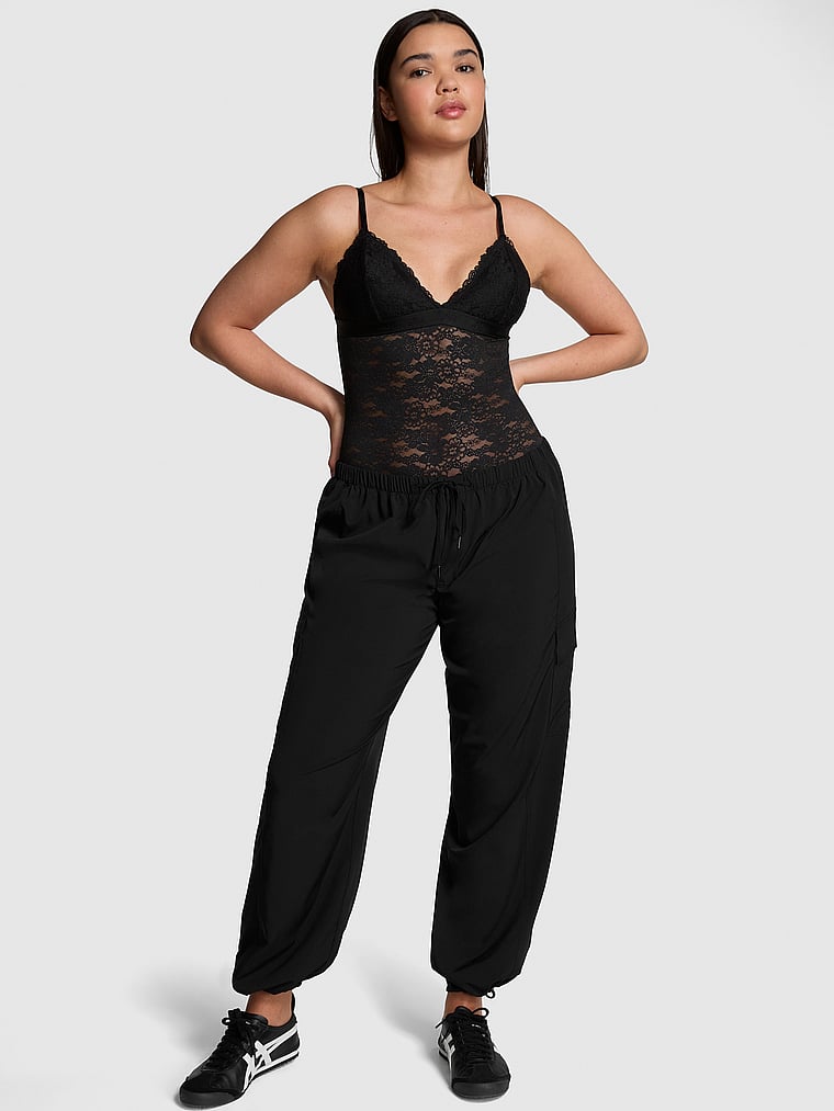 PINK Tech Stretch Cargo Pants, Pure Black, onModelFront, 1 of 4 Breanna is 5'8" or 173cm and wears Medium