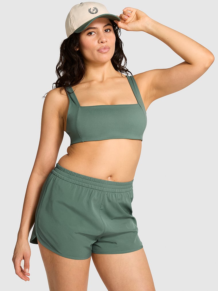 PINK Tech Stretch Running Shorts, Fresh Forest, onModelFront, 1 of 4 Isabella is 5'9" or 175cm and wears Medium