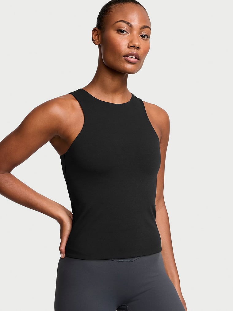 Victoria's Secret, Victoria's Secret VS Elevate Cut-Out Tank Top, Black, onModelFront, 1 of 4 Ange-Marie is 5'10" or 178cm and wears Small