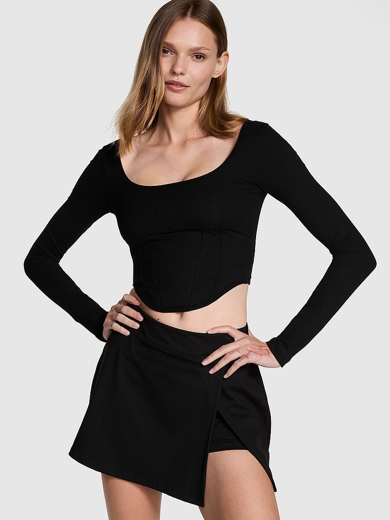 PINK The Cinched Long-Sleeve Corset Top, Pure Black, onModelFront, 1 of 3 Kjnara is 5'10" or 178cm and wears Small