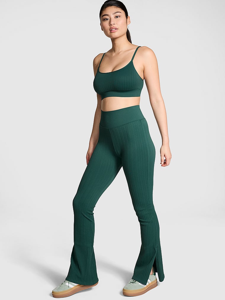 PINK Soft Seamless Cable Flare Leggings, Deep Forest, onModelFront, 1 of 3 Gloria is 5'9" or 175cm and wears Small