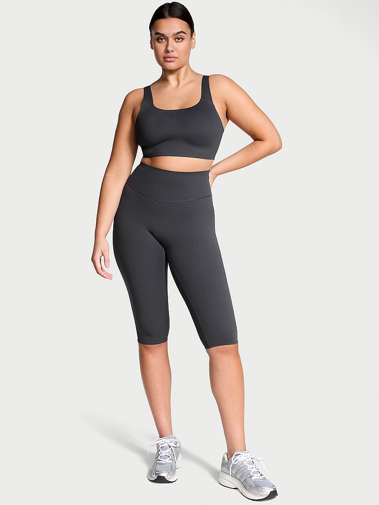 Victoria's Secret, VSX VSX Elevate™ Crop Legging, Grey Onyx, onModelFront, 1 of 3 Karmi is 5'10" or 178cm and wears Large