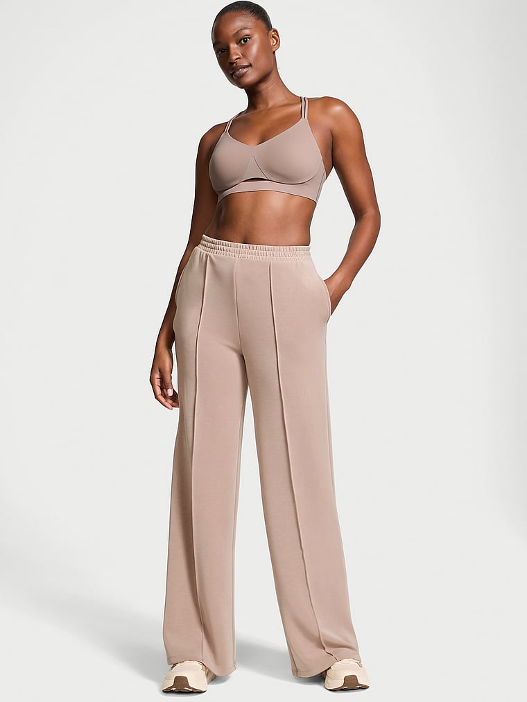 Victoria's Secret, VSX Featherweight Knit Wide-Leg Pant, Bare Taupe, onModelFront, 1 of 4 Tsheca is 5'9" or 175cm and wears Small