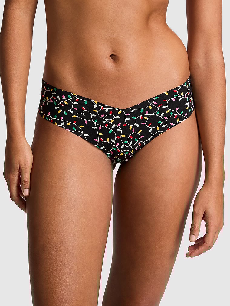 PINK Unsichtbarer String mit Spitzenbesatz und hohem Beinausschnitt, Reines Schwarz mit Lichterprint, onModelFront, 1 of 3 Vanessa ist 5'10" oder 178cm und trägt S