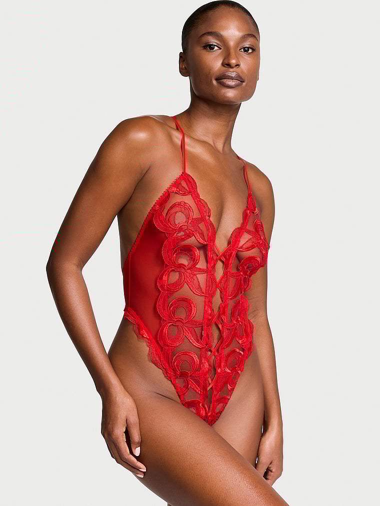 Victoria's Secret, Very Sexy Tied-with-a-Bow Embroidery Plunge Teddy, Bright Vermillion, onModelSide, 1 of 5 Tsheca is 5'9" or 175cm and wears 34B or Small