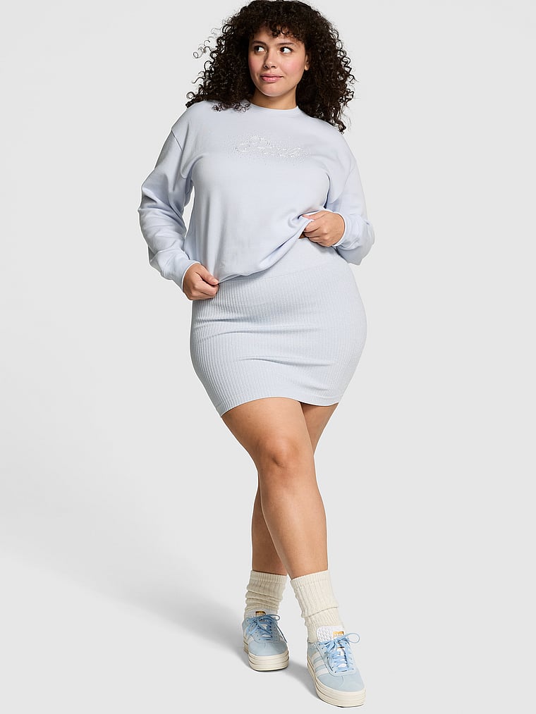 PINK Seamless Shimmer Mini Skirt, Hydrangea Blue Bling, onModelFront, 1 of 3 Diana is 5'8" or 173cm and wears Extra Extra Large