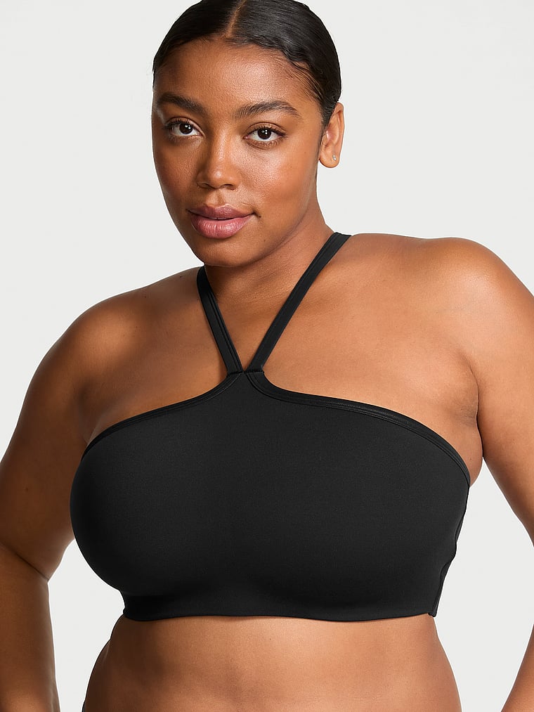 Victoria's Secret, VSX VSX Activate™ Wandelbarer Sport-BH mit Wildledereffekt, Schwarz, onModelFront, 1 of 4 Brianna ist 5'10" oder 178cm und trägt 38DD (E) oder XL
