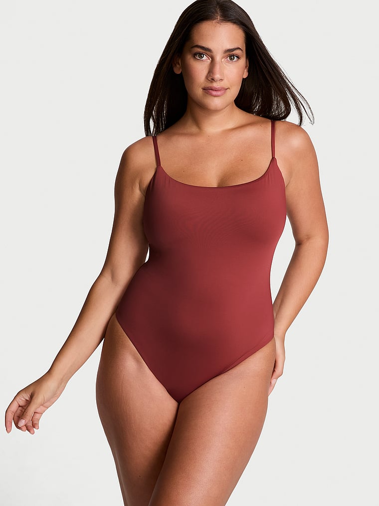 Victoria's Secret, Victoria's Secret Swim Essential Scoop One-Piece Swimsuit, Russet, onModelFront, 1 of 3 Lorena is 5'9" or 175cm and wears Large