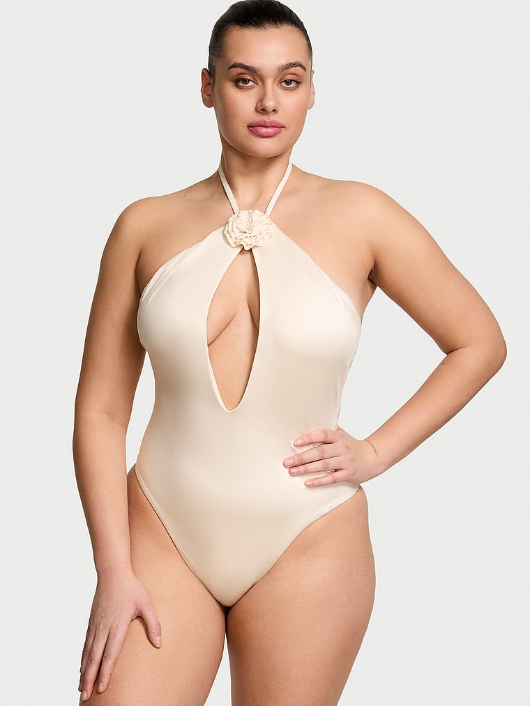 Victoria's Secret, Victoria's Secret Swim Rosette Halter Cut-Out One-Piece Swimsuit, Candlelight, onModelFront, 1 of 3 Karmi is 5'10" or 178cm and wears Large