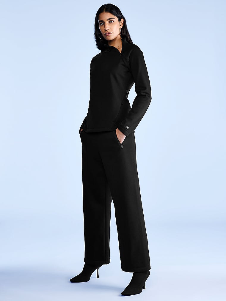Victoria's Secret, VSX VSX Movement Fleece Asymmetric Quarter-Zip, Pure Black, onModelSide, 1 of 4 Anisha is 5'11" or 180cm and wears Small