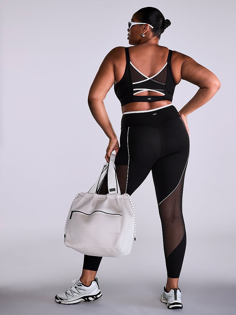 Victoria's Secret, VSX VSX Elevate™ Chroma Contours Legging, Black & Classic Plaster, onModelSide, 1 of 4 Brianna is 5'10" or 178cm and wears Extra Large
