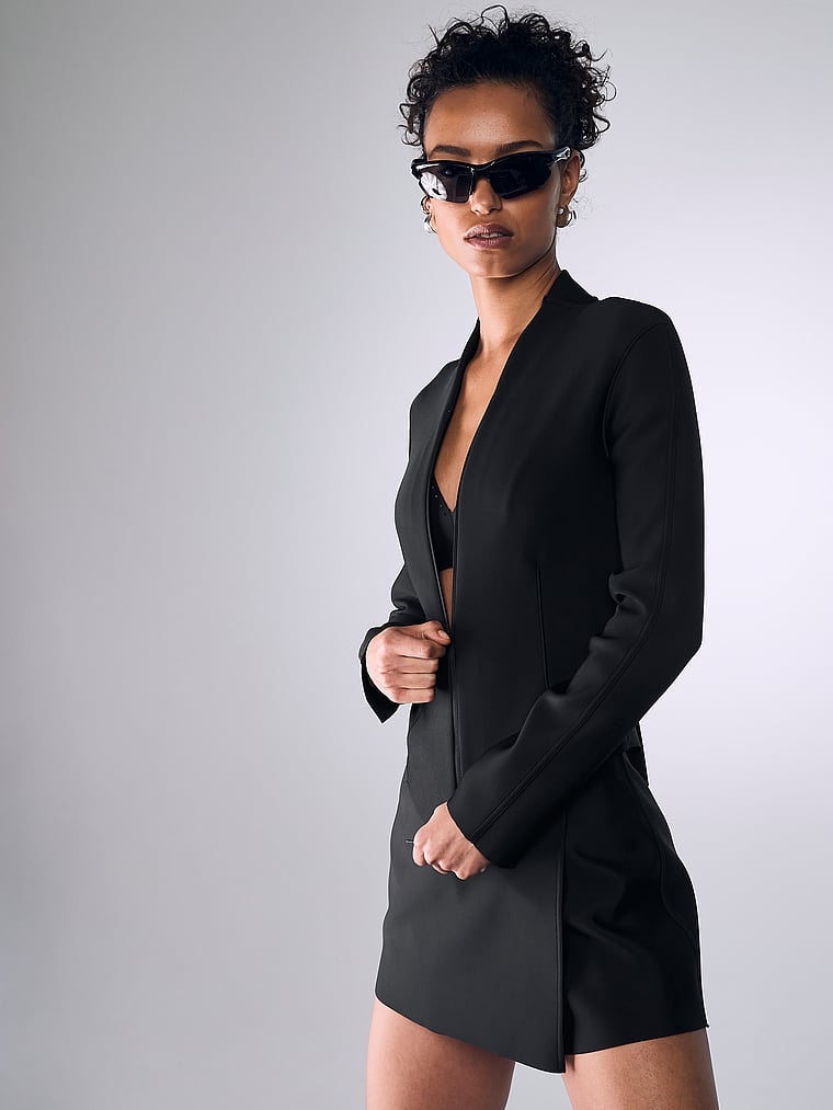 Victoria's Secret, VSX VSX Defined Scuba Zip Long-Sleeve Top, Black, onModelSide, 1 of 4 Nikita is 5'10" or 178cm and wears Small
